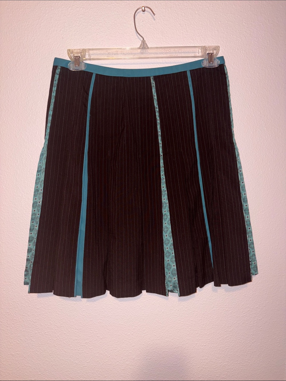 Women’s teal and brown pinstripe skirt.